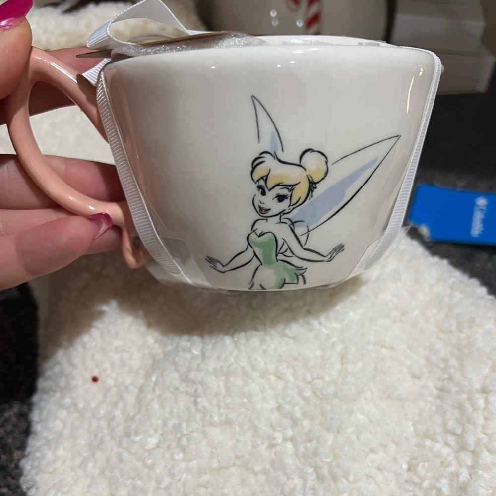 Tinker bell measuring cups with handle. New with tags.